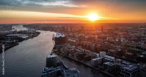 A summer sunset in Hamburg, Germany. Aerial view on Hamburg Elbphilarmonie and port. Time Lapse.