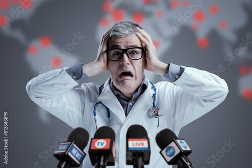 Terrified medical scientist interviewed by the media photo