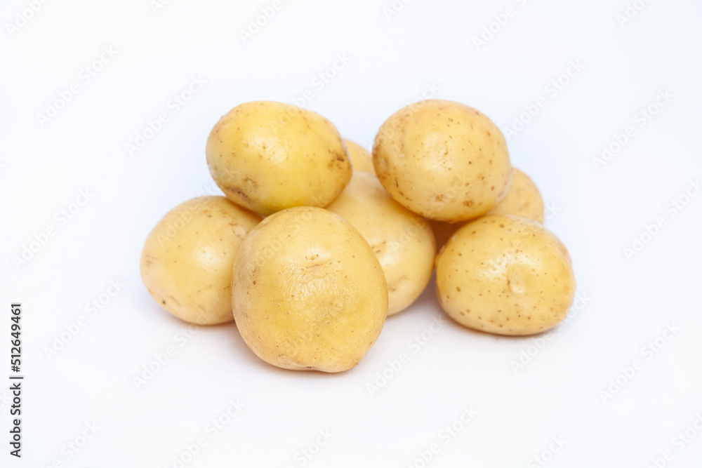 Young rustic raw potato on white background
Young rustic raw potato on white background