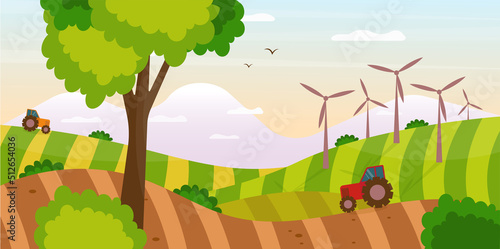 Tractors are working on agriculture fields with growing alternative fuel resources. Wind energy concept, rapeseed energy concept.