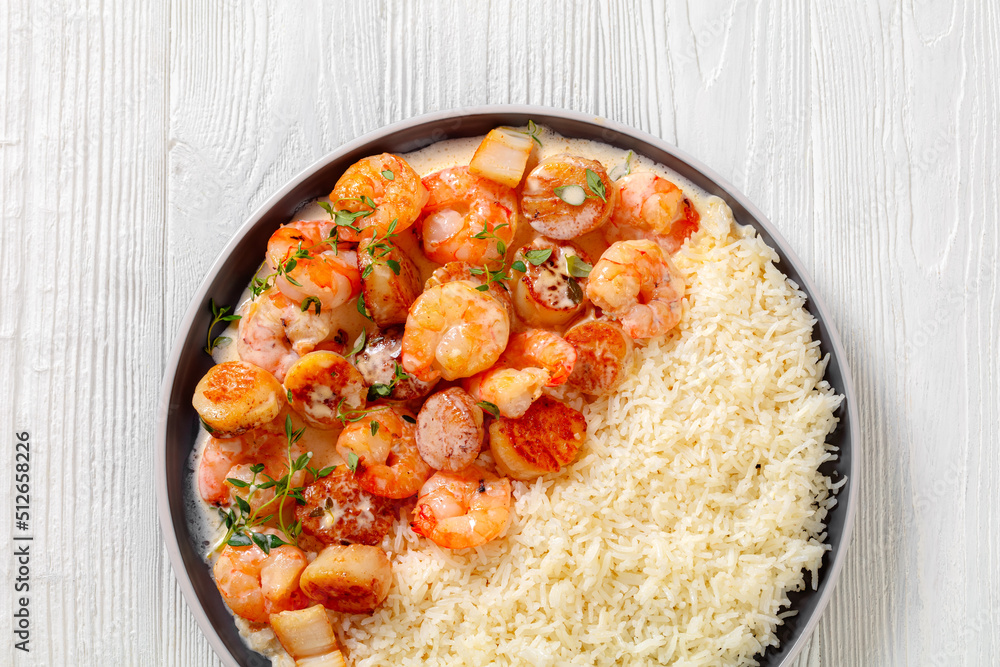 shrimps and scallops with coconut sauce and rice shrimps and scallops with coconut sauce and rice