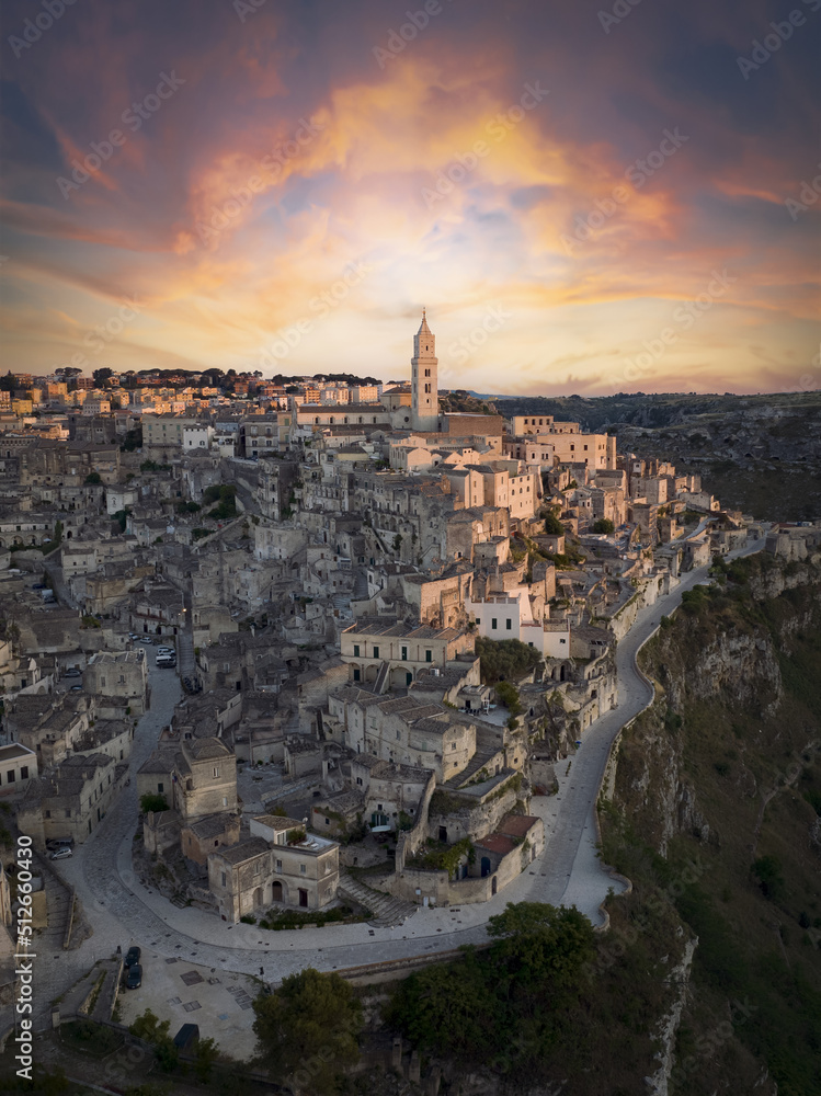 View from above, stunning aerial view of the Matera’s skyline during a beautiful sunrise. Matera is a city on a rocky outcrop in the region of Basilicata, in southern Italy..