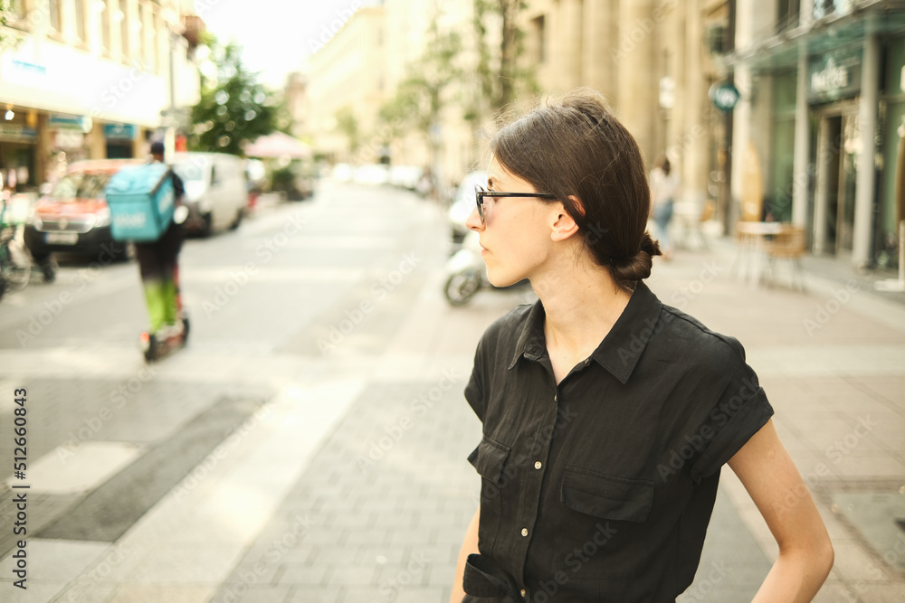 business woman walking in the street business woman walking in the street
