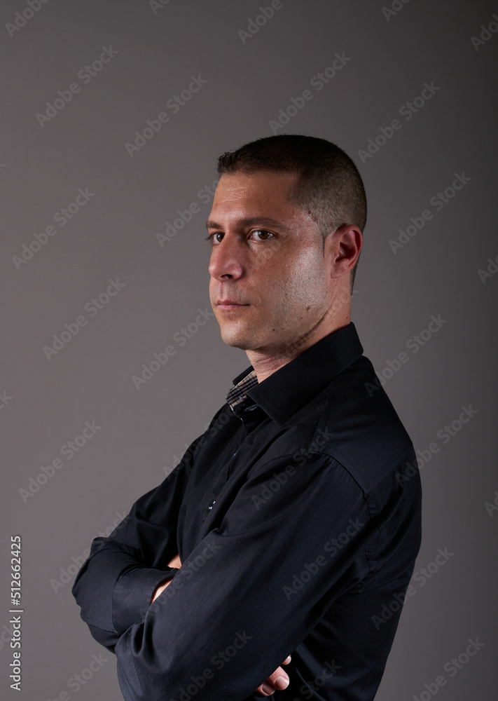 A young man in a black shirt A young man in a black shirt