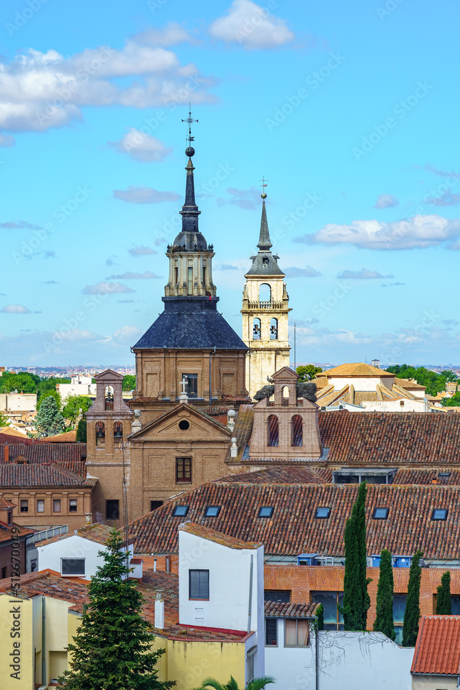 Old buildings and church towers of the monumental city of Alcala de Henares in Madrid.