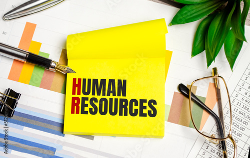yellow sticker with the text human resources and charts
