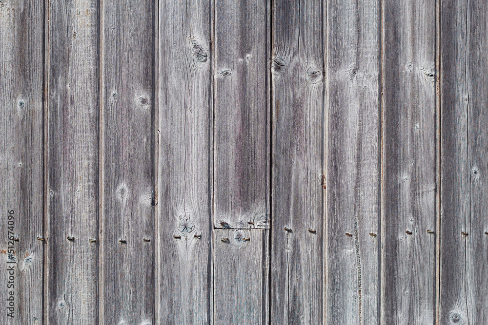 old wooden wall with vertical grey planks old wooden wall with vertical grey planks