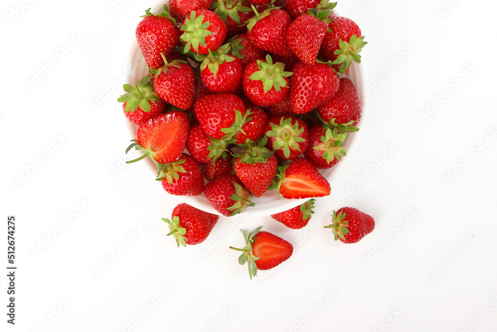 Red ripe strawberry in the white bowl Red ripe strawberry in the white bowl