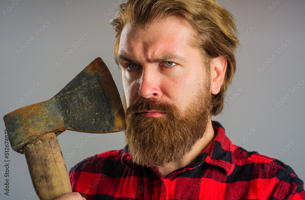 Serious bearded man with hatchet. Canadian lumberjack with old axe. Cutting  wood. Logger tools. Stock Photo | Adobe Stock