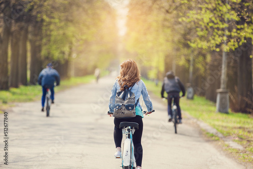 Fototapeta Naklejka Na Ścianę i Meble -  woman on bicycle in park