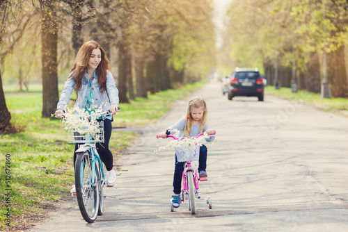 parent and child riding bikes