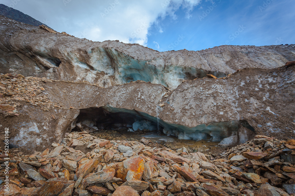 Intense ice breakup of the Vallelunga glacier tongue with caves formation, Alto Adige, Italy. The glacier is in rapid retreat caused by global warming Intense ice breakup of the Vallelunga glacier tongue with caves formation, Alto Adige, Italy. The glacier is in rapid retreat caused by global warming