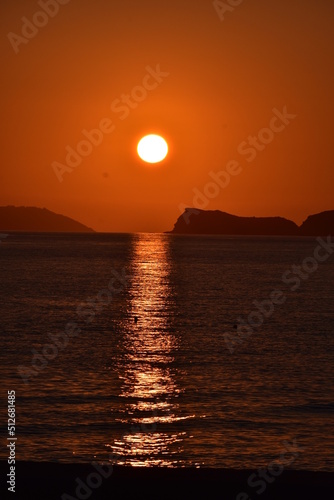 Beautiful sunset from Arillas beach in Corfu Greece