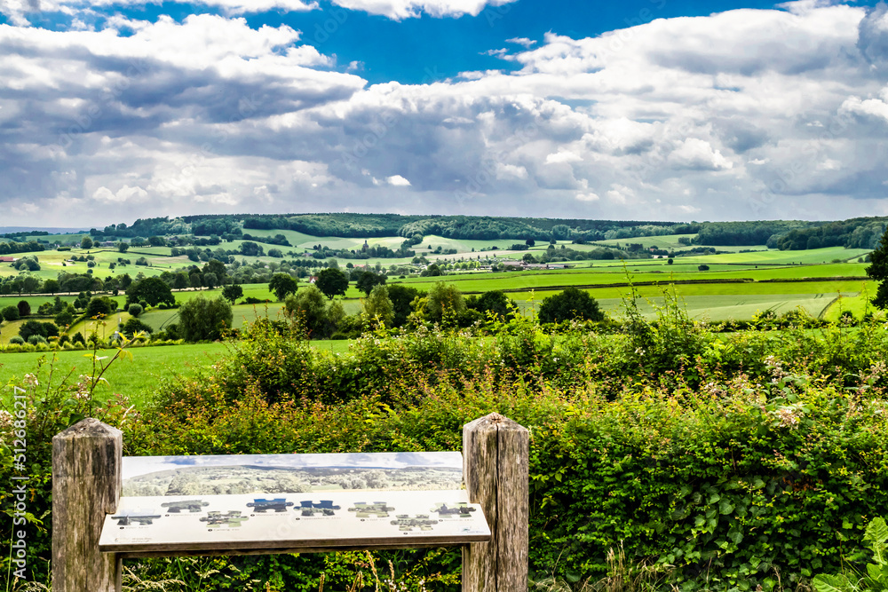 Panoramic summer landscape with rolling valleys in Limburg. Tourist attractions for hiking in the Netherlands.