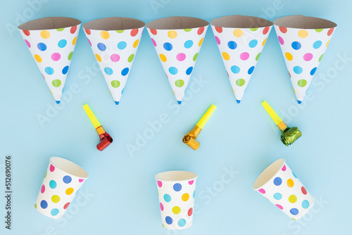 Birthday party hats on blue background