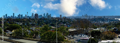 Panorama view of Sydney CBD and Sydney Harbour. Distant view of High-rise office towers and high-rise apartment buildings. Suburban Sydney Suburbs in the foreground NSW Australia 