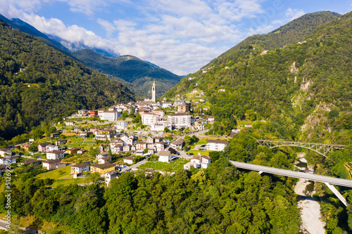 Picturesque summer view from drone of alpine township of Intragna surrounded by green Alps, canton of Ticino, Switzerland. photo
