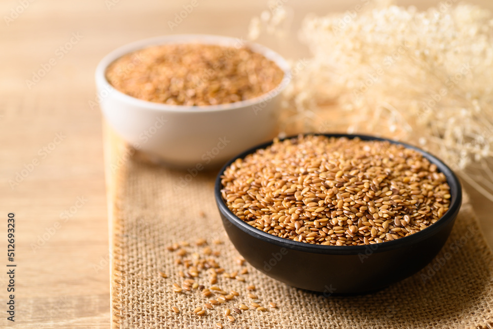 Golden flax seed or linseed in bowl, Healthy food ingredients Golden flax seed or linseed in bowl, Healthy food ingredients
