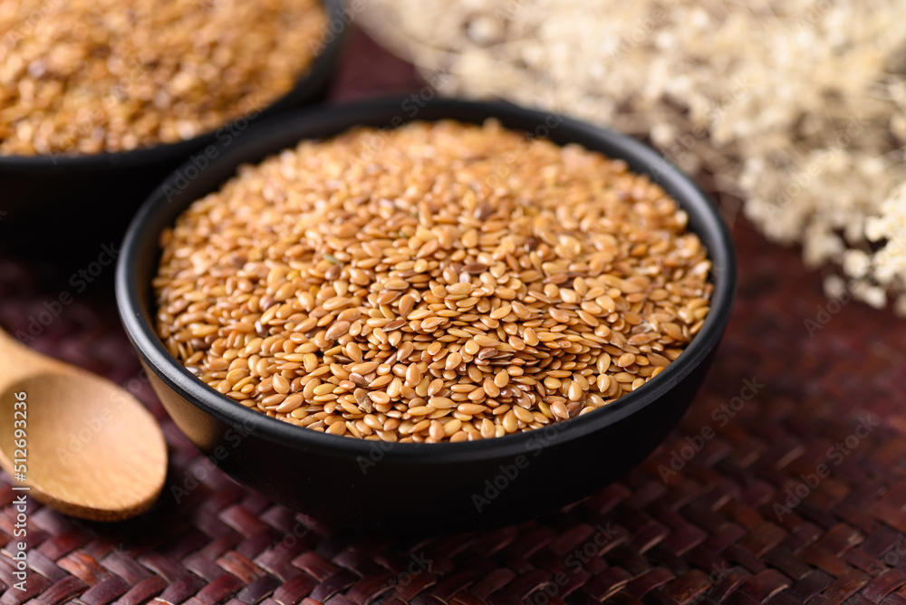 Golden flax seed or linseed in bowl, Healthy food ingredients Golden flax seed or linseed in bowl, Healthy food ingredients