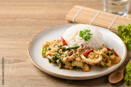 Thai stir fried curry squid and cooked rice, Thai food