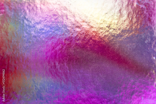 Mermaid pink, red and purple colorful metallic holographic iridescent shiny foil texture background