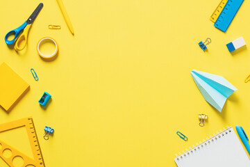 School supplies double border banner design. Top view yellow background with office stationery. Back to school concept.