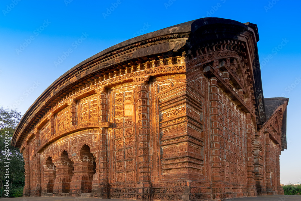 Radhashyam Temple - made of terracotta (fired clay of a brownish-red colour, used as ornamental building material) artworks at Bishnupur, West Bengal, India. Popular UNESCO heritage site of India.
