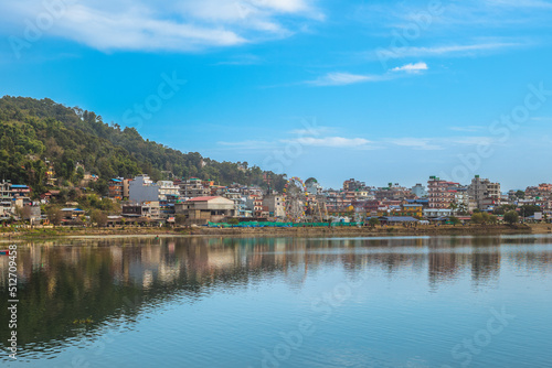 scenery of pokhara by fewa (phewa)  lake in nepal photo