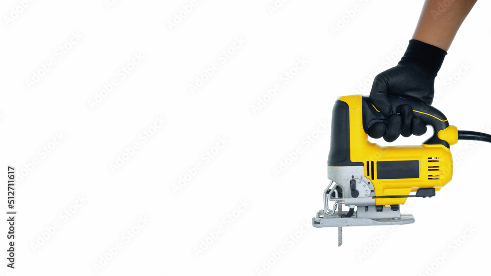 one hand wearing black gloves holding jigsaw isolated white background one hand wearing black gloves holding jigsaw isolated white background