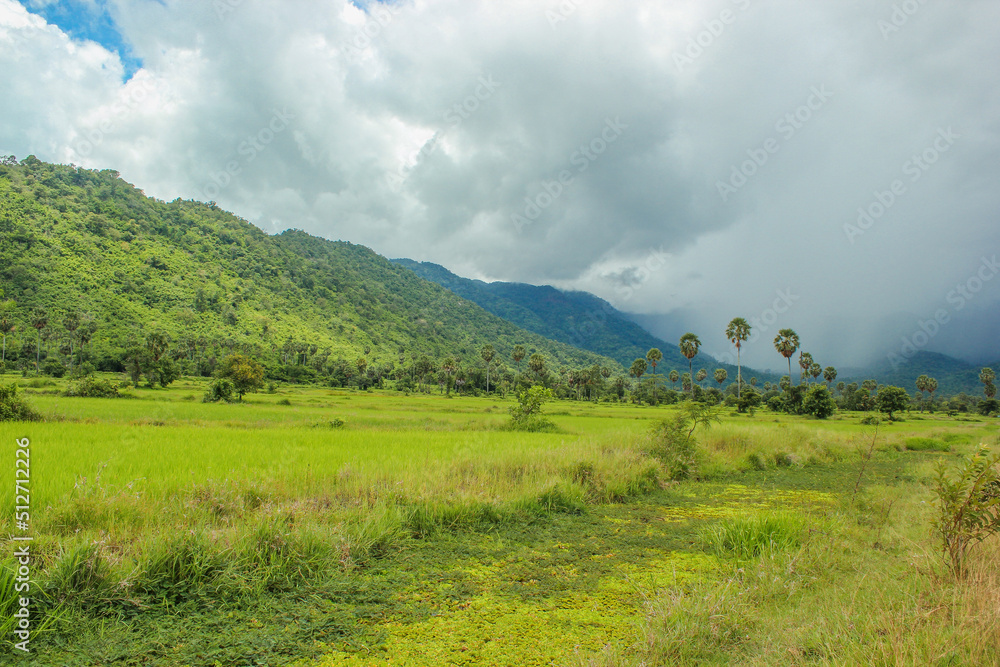 Countryside road surrounded by mountains