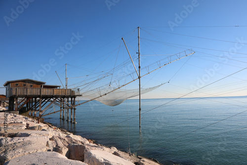Wooden building called TRABUCCO in Italian language and the fishing nets