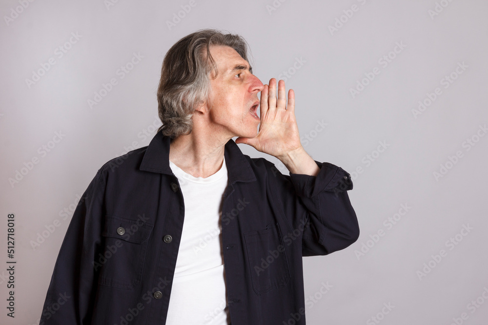 A screaming man on a white background. A screaming man on a white background.