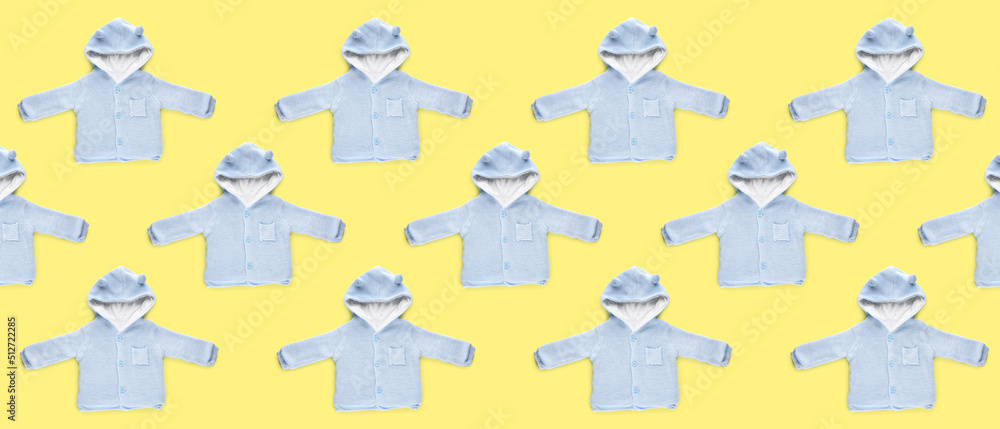 Naklejka premium Children's clothes on white background