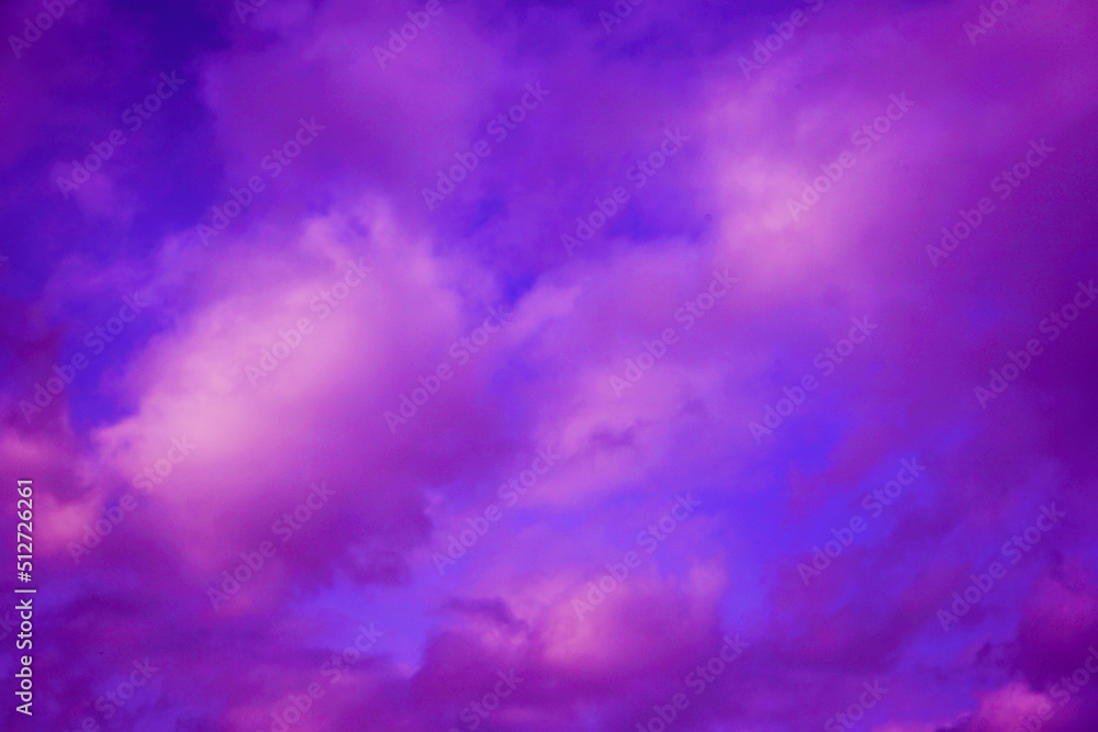Blue sky with pink purple cloud. Fantasy. Fantastic sunset background with space for design.