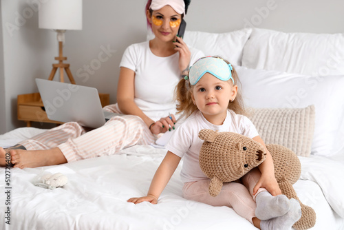 Cute little girl with toy a...