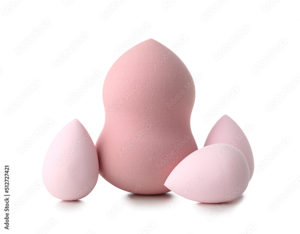 Pink make up sponges on white background Pink make up sponges on white background