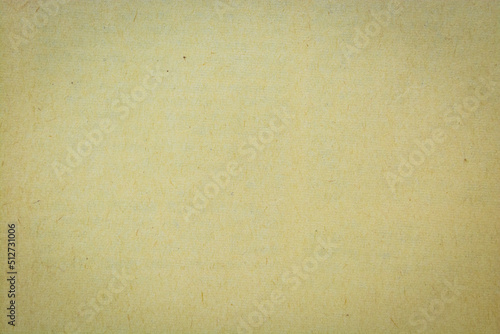 Brown recycled craft paper texture as background. Cream paper texture, Old vintage page or grunge vignette. Pattern rough art creased grunge letter. Hardboard with copy space for text. © Uuganbayar