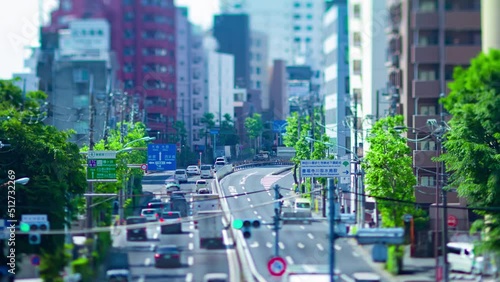 A timelapse of the miniature traffic jam at the urban street in Tokyo panning