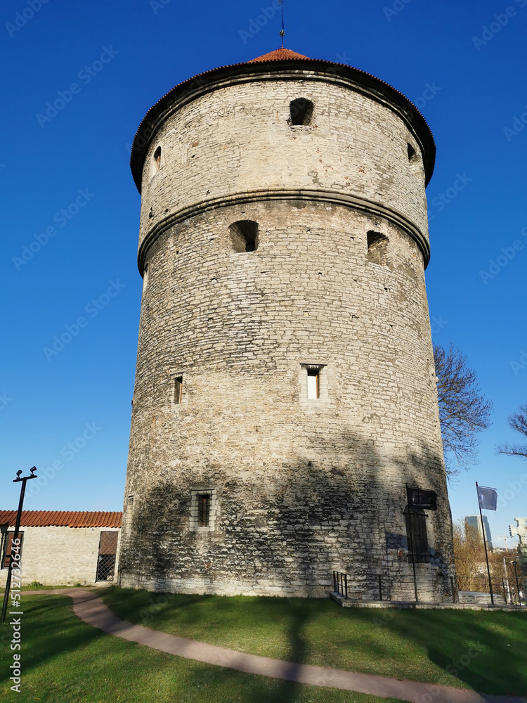 Artillery tower Kik-in-de-Kök of the medieval defensive wall of the city of Tallinn against the blue sky.