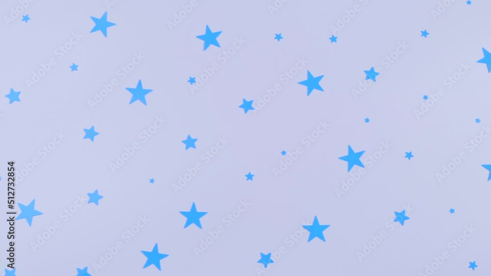 Rotating white background with blue stars, birthday or party concept.Children purple background Rotating white background with blue stars, birthday or party concept.Children purple background