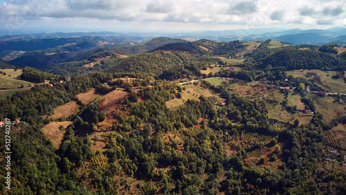 View of countryside hilly landscape in autumn colors.