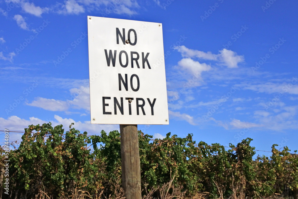 Sign reading No Work No Entry