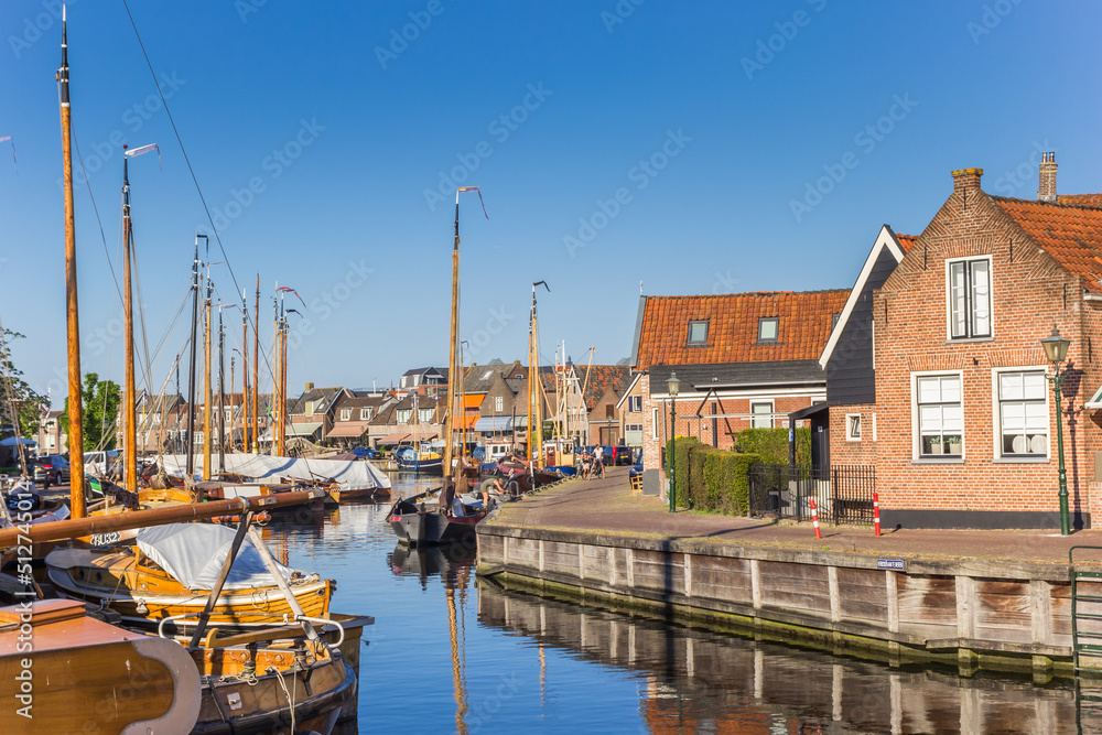 Old houses and ships in the harbor of Spakenburg, Netherlands