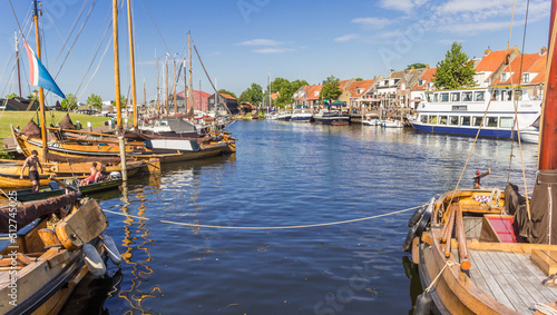 Traditional wooden boats in the harbor of Elburg, Netherlands photo