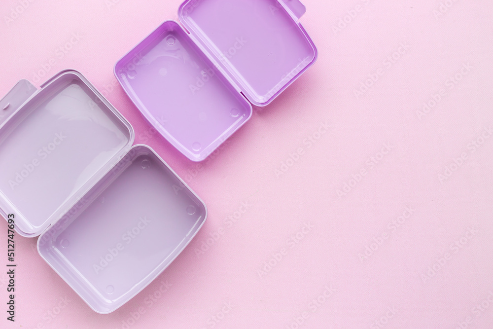 Empty purple lunch boxes, top view. Plastic container for food Empty purple lunch boxes, top view. Plastic container for food