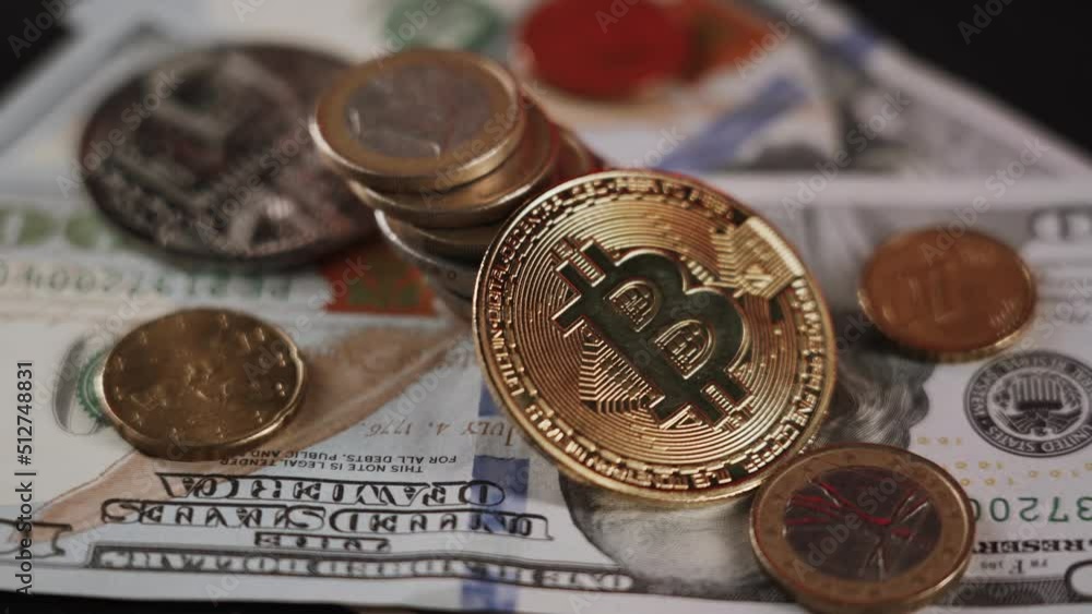 Bitcoin BTC coin rotating on a black background Bitcoin BTC coin rotating on a black background