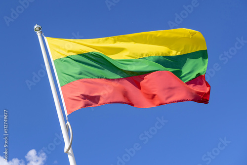 flag of Lithuania flying in the wind photo