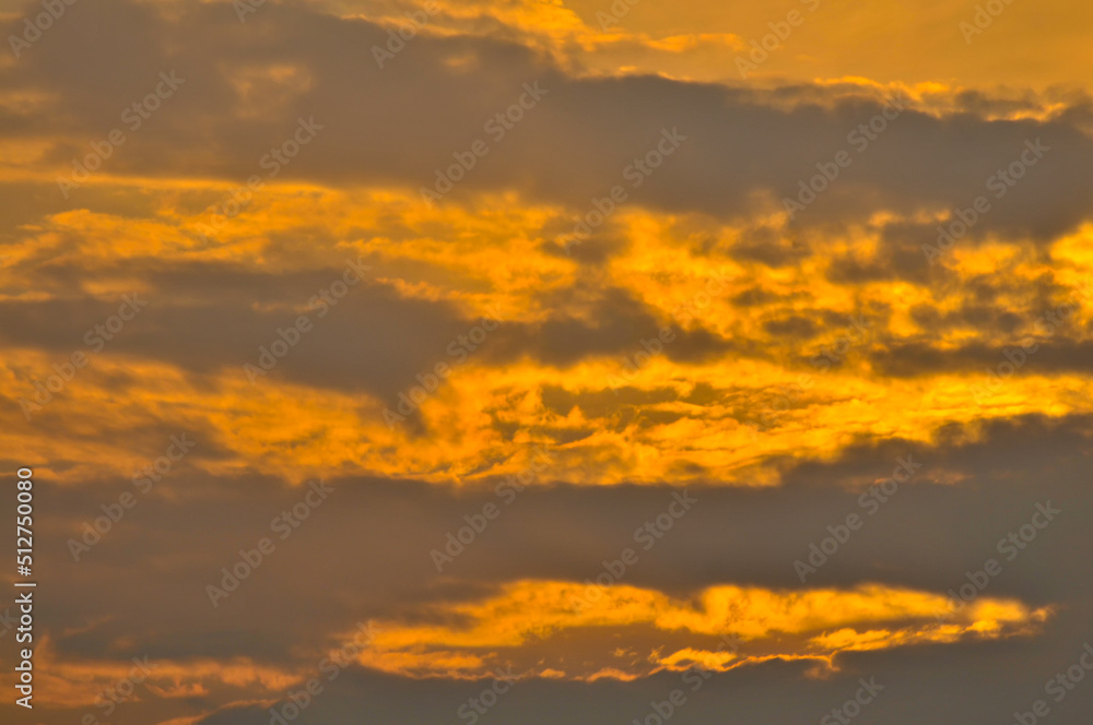 sun ray is go down and amazing dramatic orange cloud