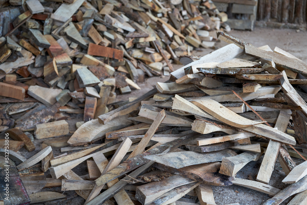Closeup of dry firewood stack in firewood house Closeup of dry firewood stack in firewood house
