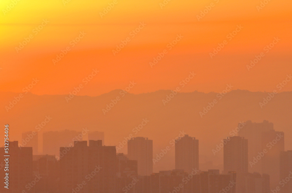 fog over the city in sunrise